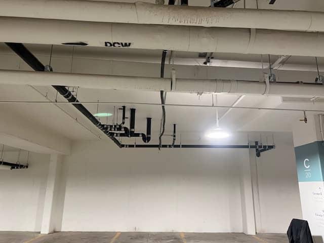 Building automation control panel showing digital thermostats, zone controls, and monitoring systems for HVAC management